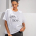 Λευκό T-Shirt “Όλα. Πολύ.”